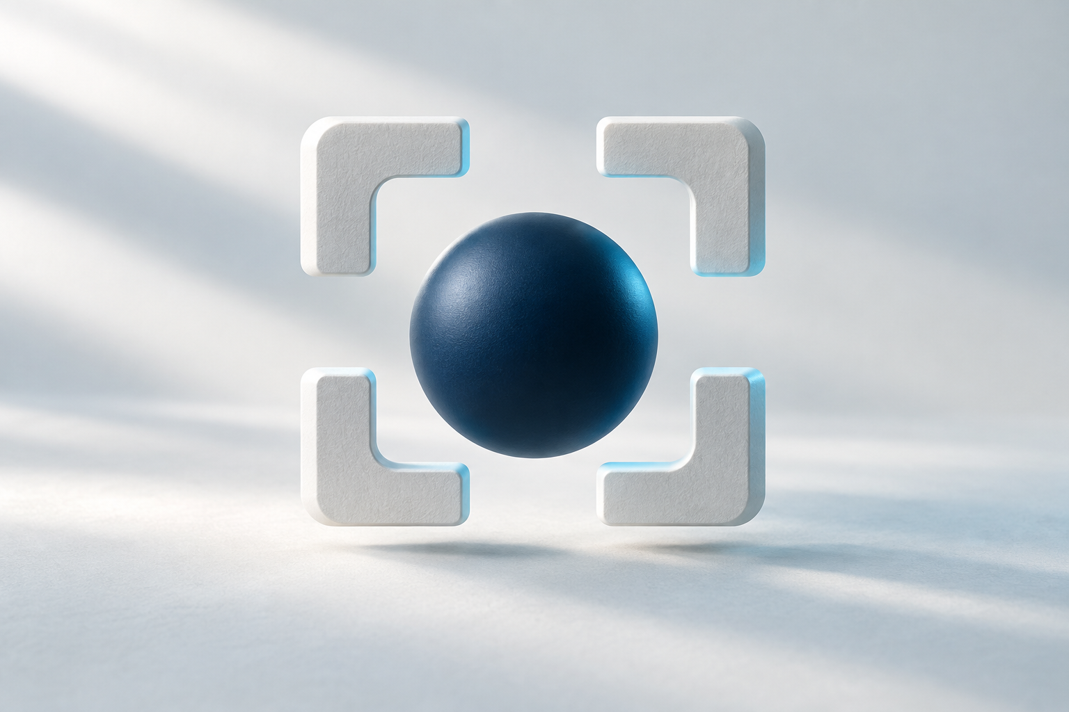 Four white focus brackets framing a navy sphere, illuminated by cyan light